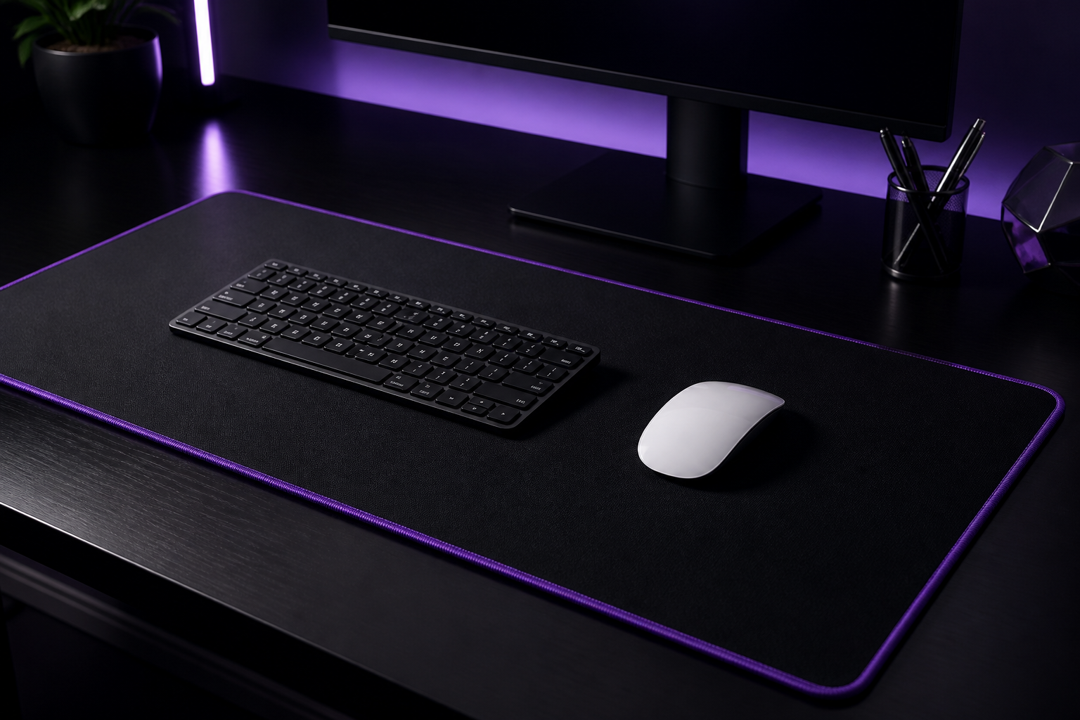 Premium black desk mat with purple stitched edge, keyboard and white mouse